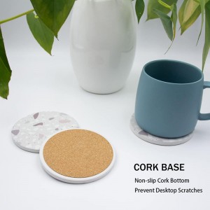 Absorbent ceramic coaster with cork back and gold metal holder